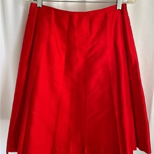 Pleated red silk skirt from Banana Republic.